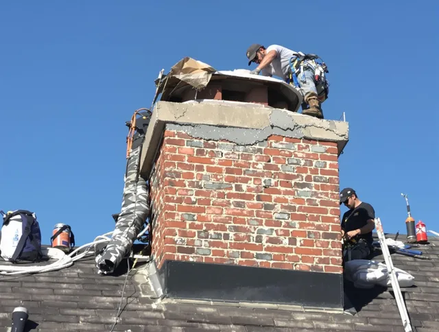 Ravenna Chimney Sweep installing a custom chimney crown in Ravenna, OH