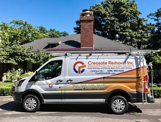 Ravenna Chimney Sweep technician removing creosote safely in Ravenna, OH